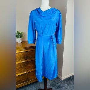 Vintage royal blue midi dress features a distinctive cowl neck and a tie waist